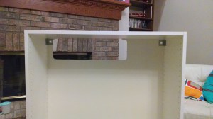 This is a 36" wide cabinet. The hole is about two feet.